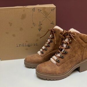 Women’s faux leather her and shearling booties